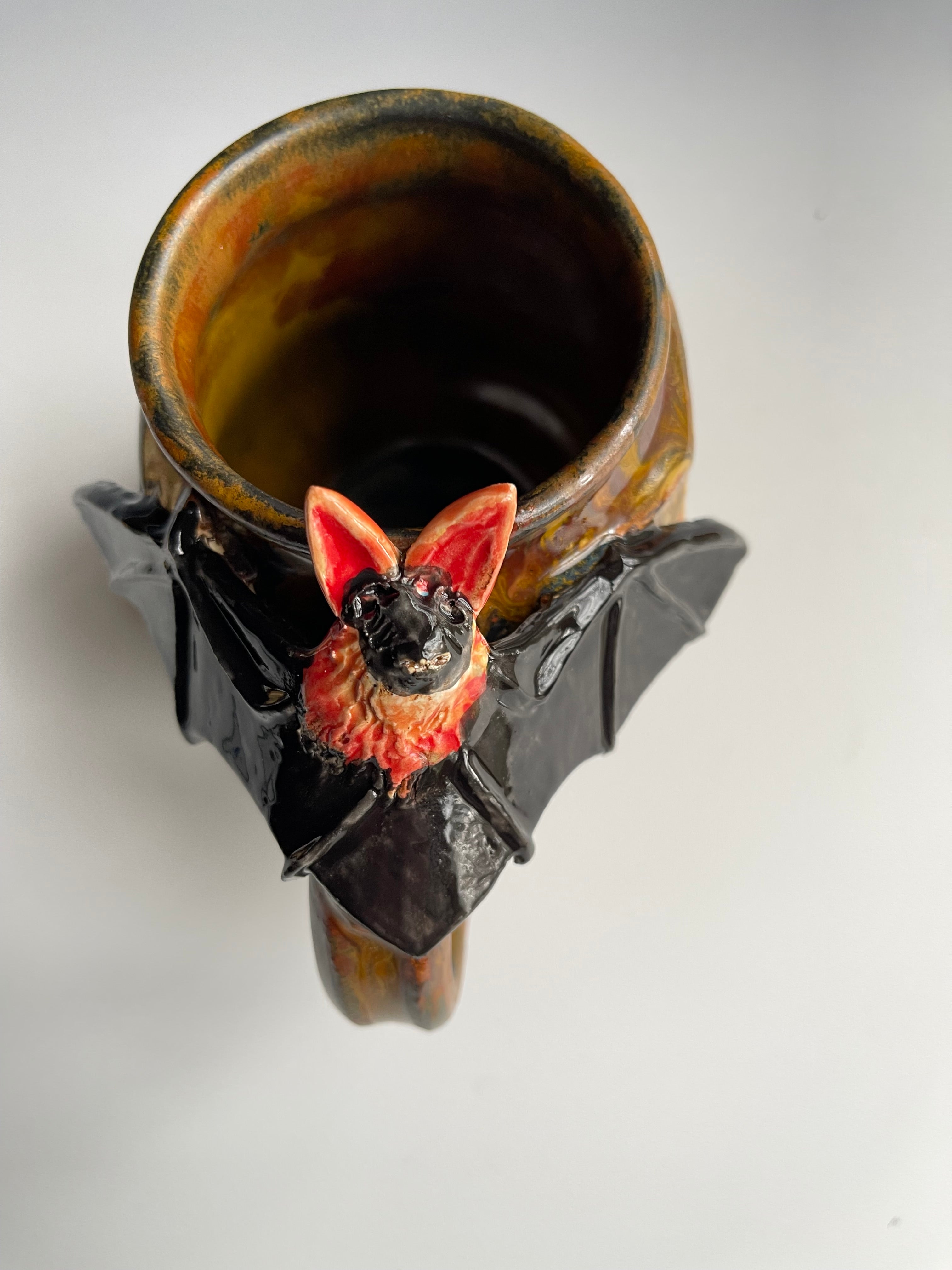 Ceramic sculpture mug with bat