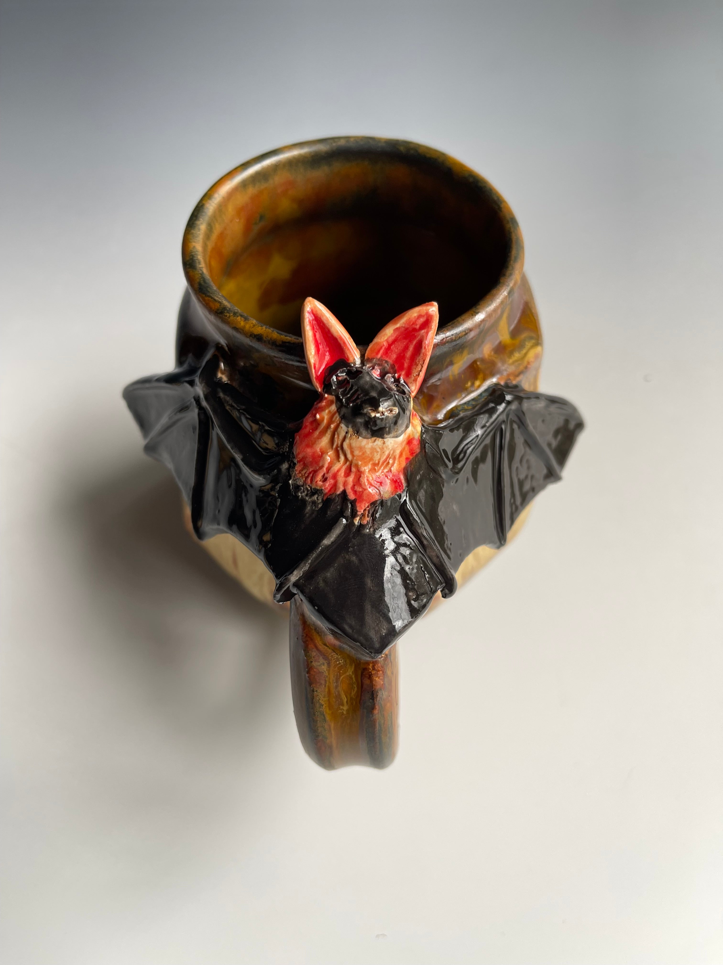 Ceramic bat sculpture mug