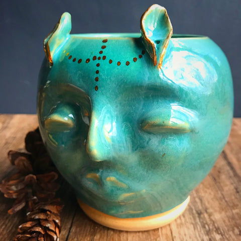 Deer Woman planter with gold luster in Turquoise glaze 4 1/2” H